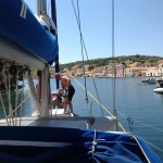 Sailing boat entering Gaios, Paxos, Greece